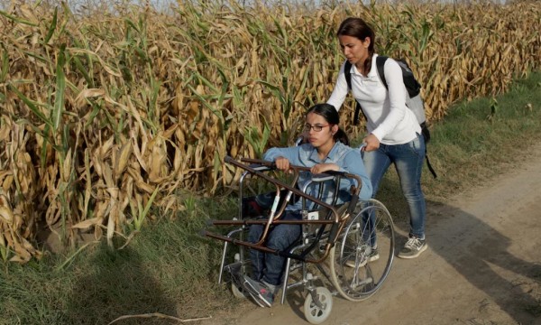 Escapó de Siria en silla de ruedas